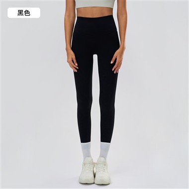 Treballs de pantalons de ioga de ioga de la cintura alta que es polaven a les polaines